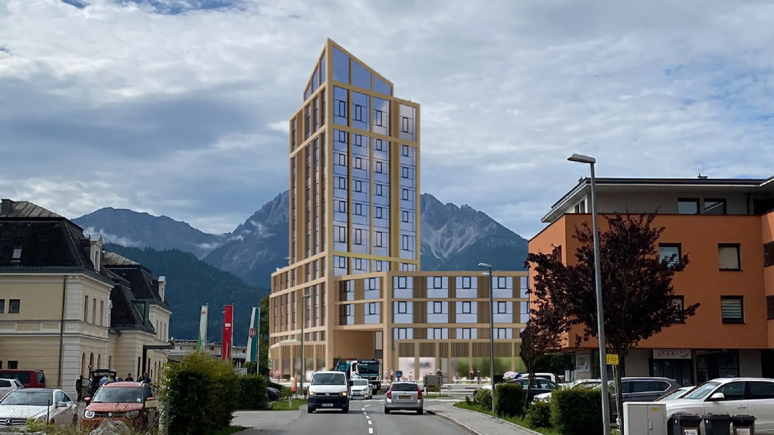 Geplantes Hochhausprojekt von Pletzer Immobilien mit moderner Holzarchitektur und Bergkulisse.